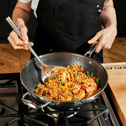 Fried rice being made in the HexClad 12' stainless steel wok