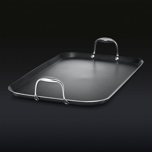 The HexClad Hybrid Double Burner Griddle on a black background.