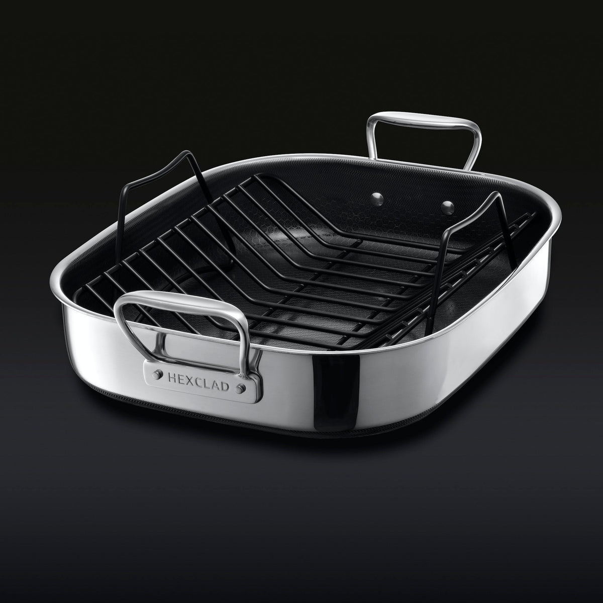 The HexClad Hybrid Roasting Pan with a black rack sitting inside inside.