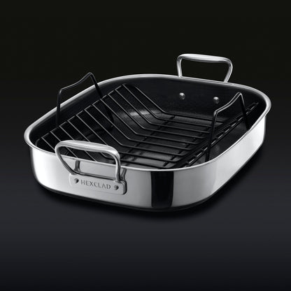The HexClad Hybrid Roasting Pan with a black rack sitting inside inside.